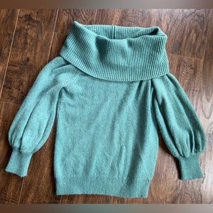 Express sweater. Very thick. Cow neck, puffy sleeves. Runs big. Lightly worn.